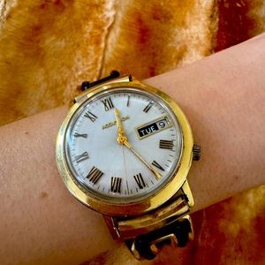 Vintage And Rare Bulova Accutron with original watch band. A standout piece.